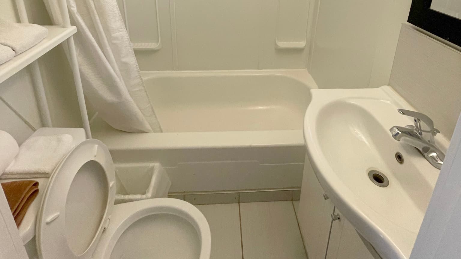 Guest bathroom with a bathtub and shower